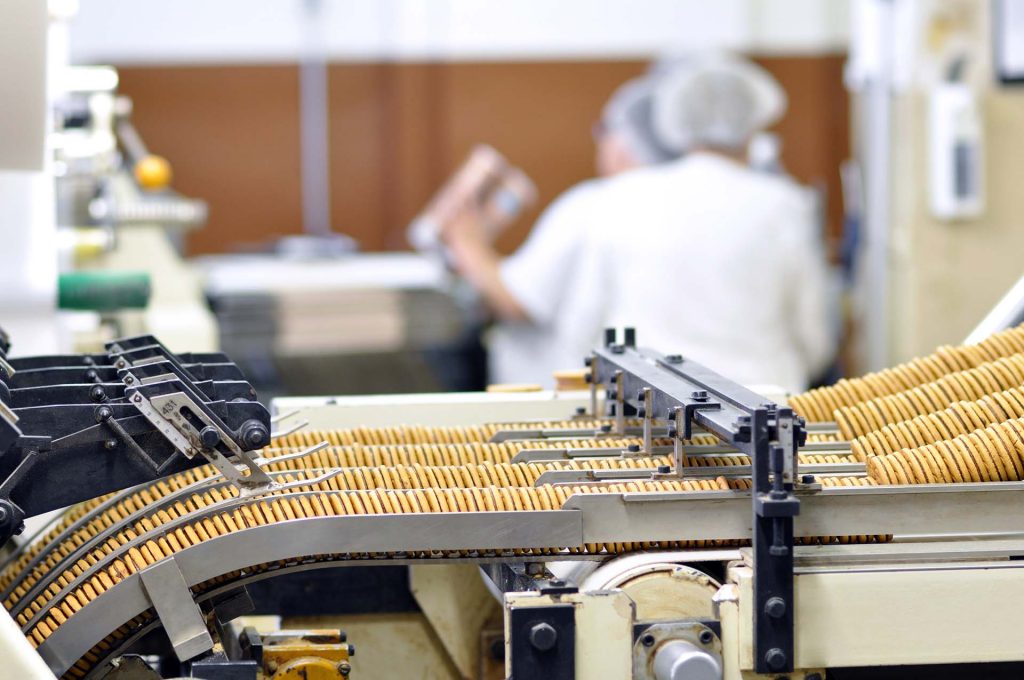 food industry - biscuit production in a factory on a conveyor belt